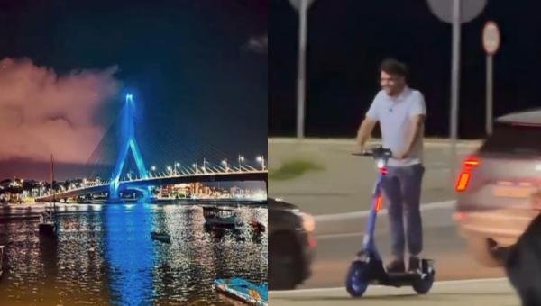 PREFEITO VALDERICO JÚNIOR CHEGA DE PATINETE À SOLENIDADE DE REINAUGURAÇÃO DA ILUMINAÇÃO CÊNICA DA PONTE JORGE AMADO